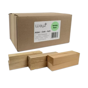 variety-way2outdoors_3500x2500_lossy Box of variety pack fire wood. Variety pack includes oak, ash and alder. Individual pieces shown in front of box